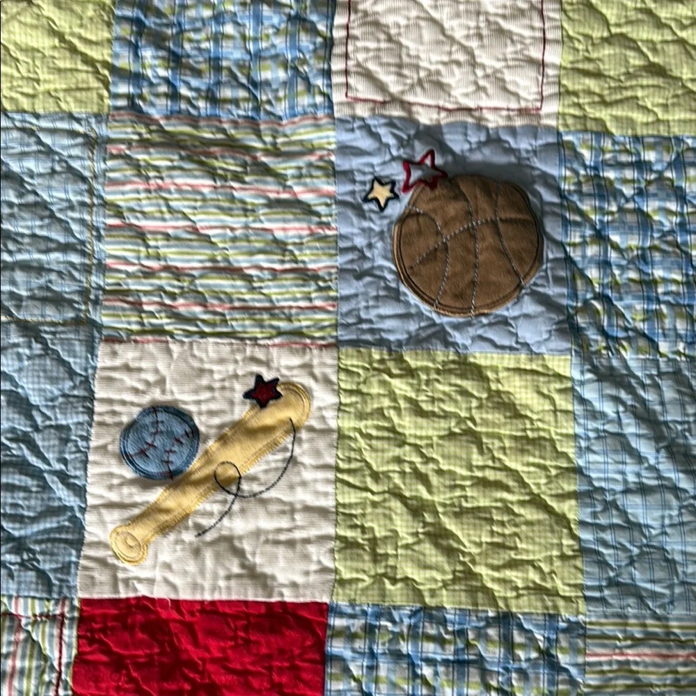 Varsity Baby Quilt with Red and Yellow Accents. Home quilted